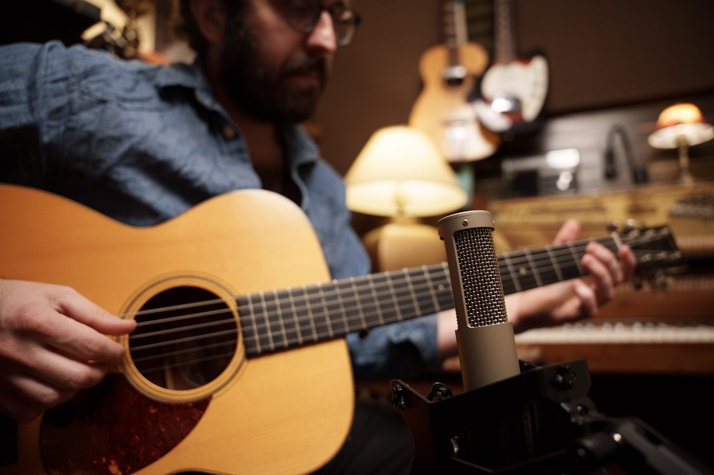 R-12 ribbon mic capturing acoustic guitar — close